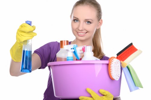 Local team cleaning a bin store and entrance area in Surrey